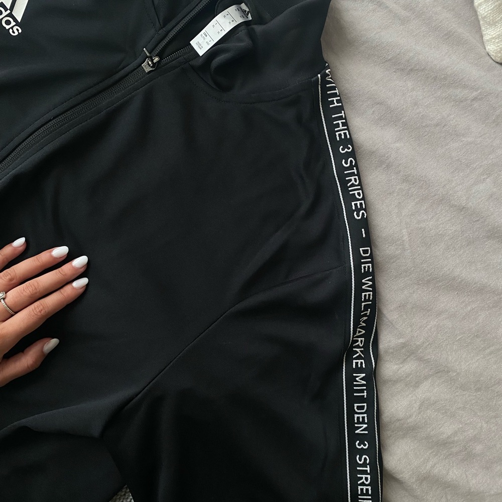 Adidas men’s track jacket.